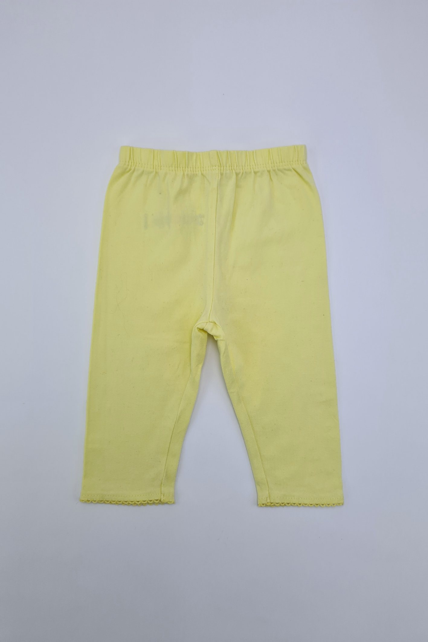 3-6 mois - Leggings jaunes avec ourlet à volants