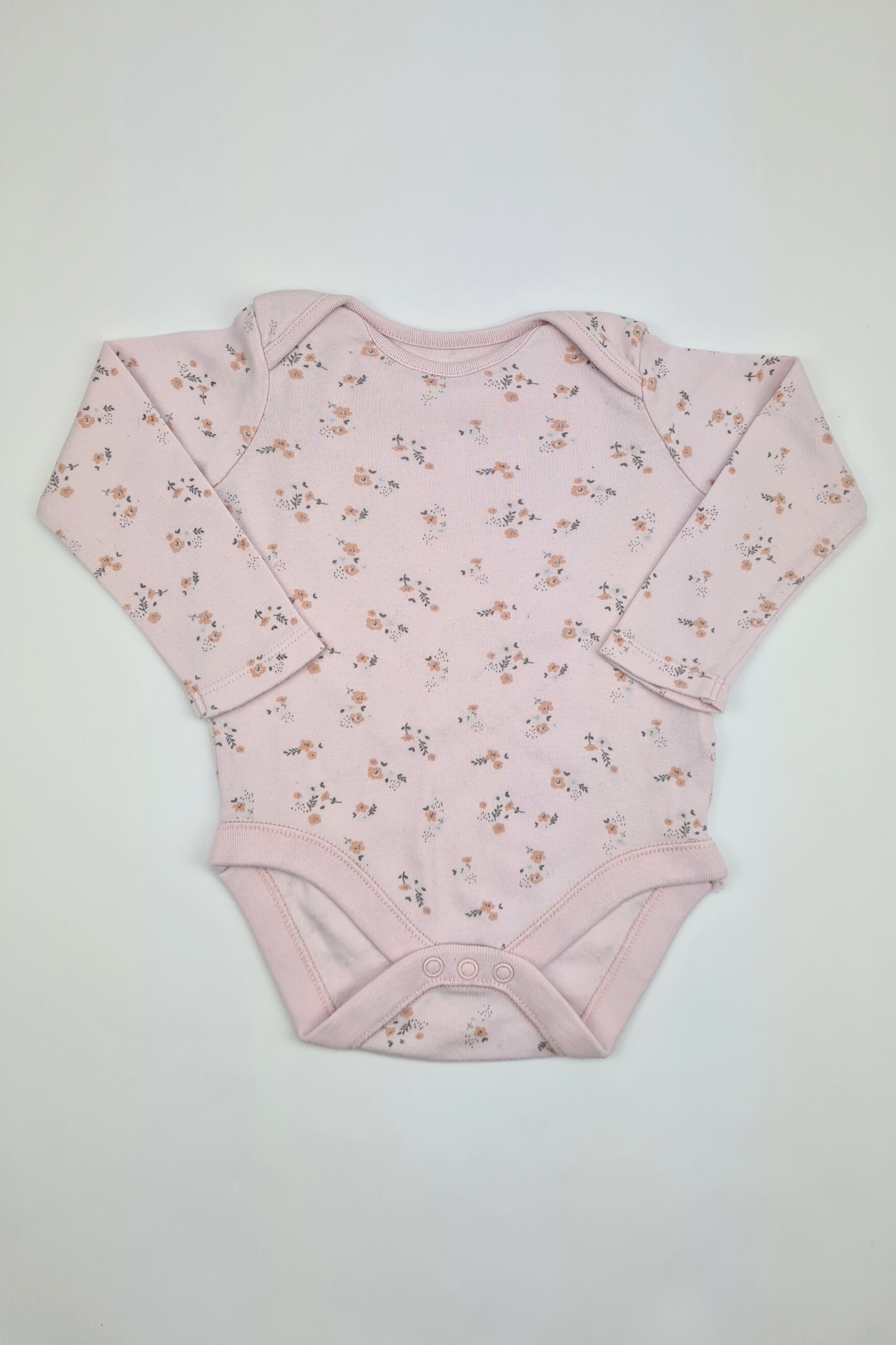 6-9 mois - Body rose imprimé fleurs