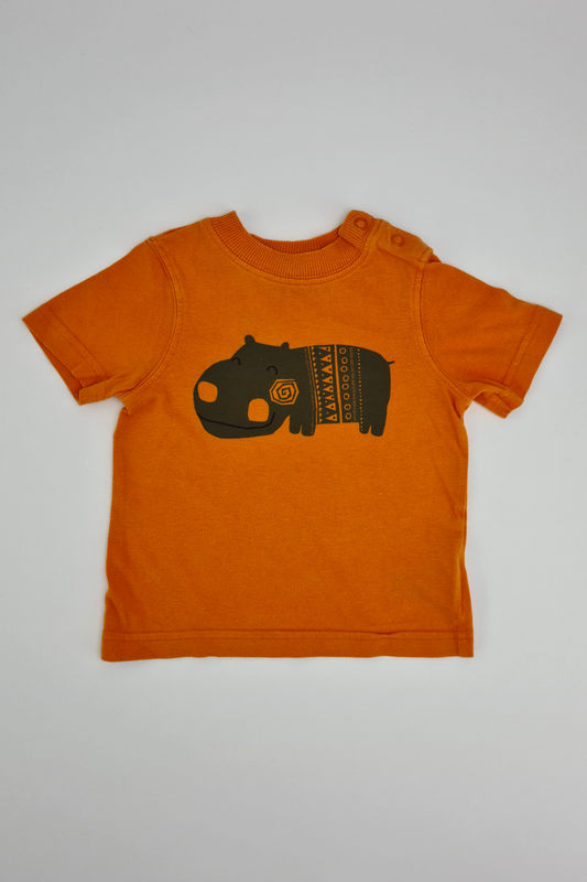 6–9 m – Orangefarbenes Nilpferd-T-Shirt