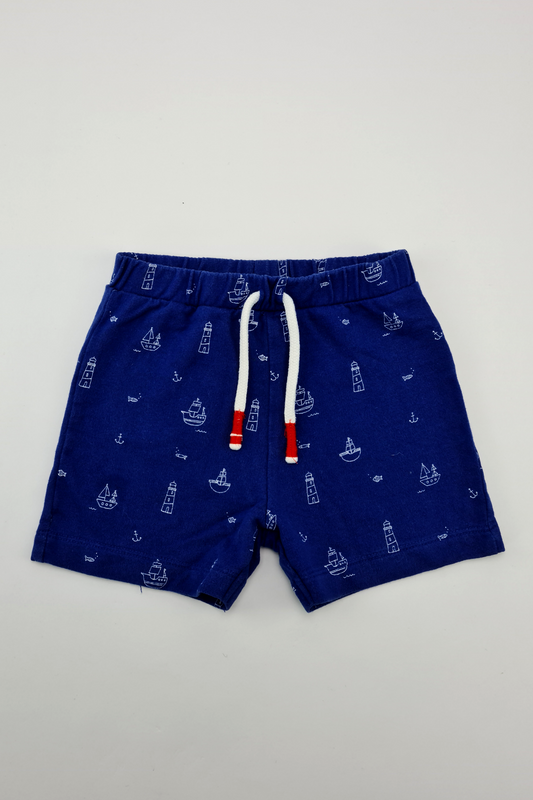 9–12 m – blaue Shorts