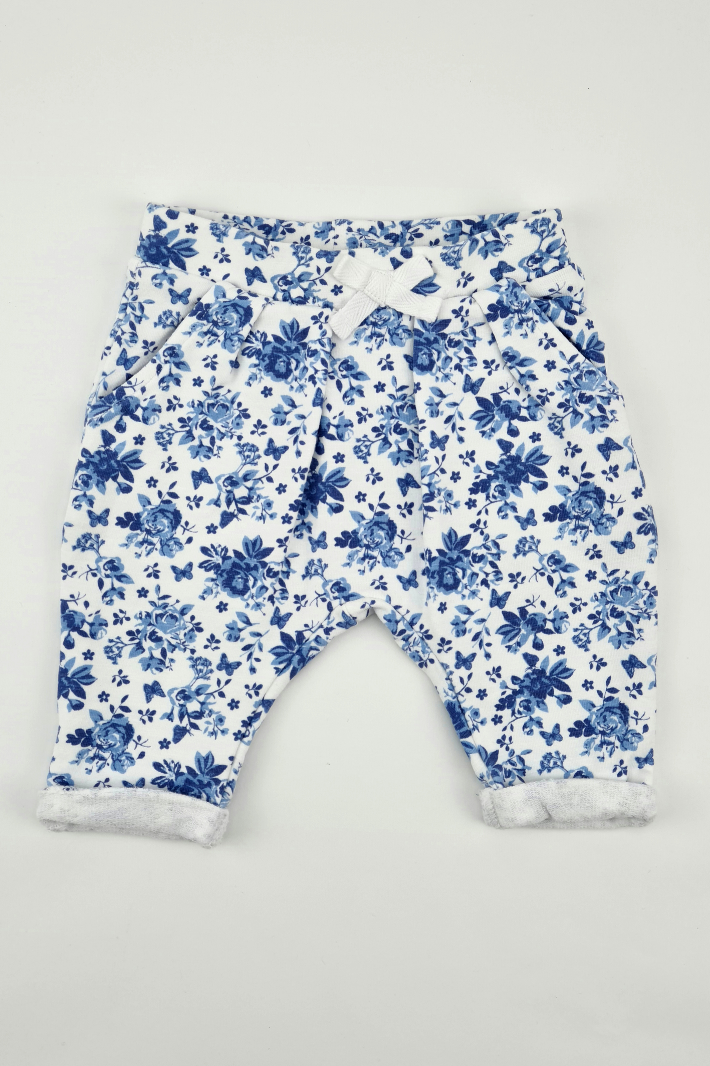Neugeborenes (7 Pfund) - Blaue Jogginghose mit Blumenmuster (Muskatnuss)